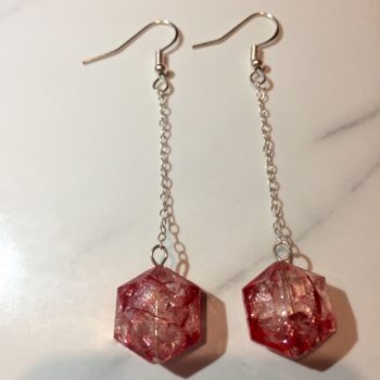 Hook earrings with chain which holds red crackle effect beads