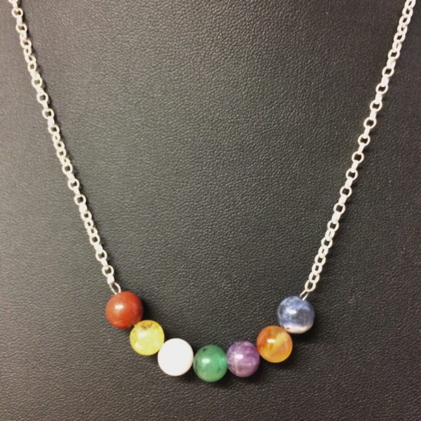 A necklace with 925 sterling silver chain and 8mm gemstone beads in the order of the colours of the rainbow song