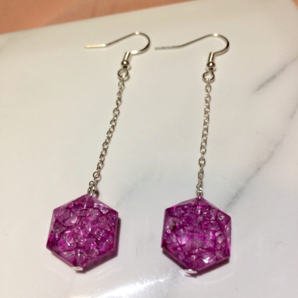 Hook earrings with chain which holds purple crackle effect beads