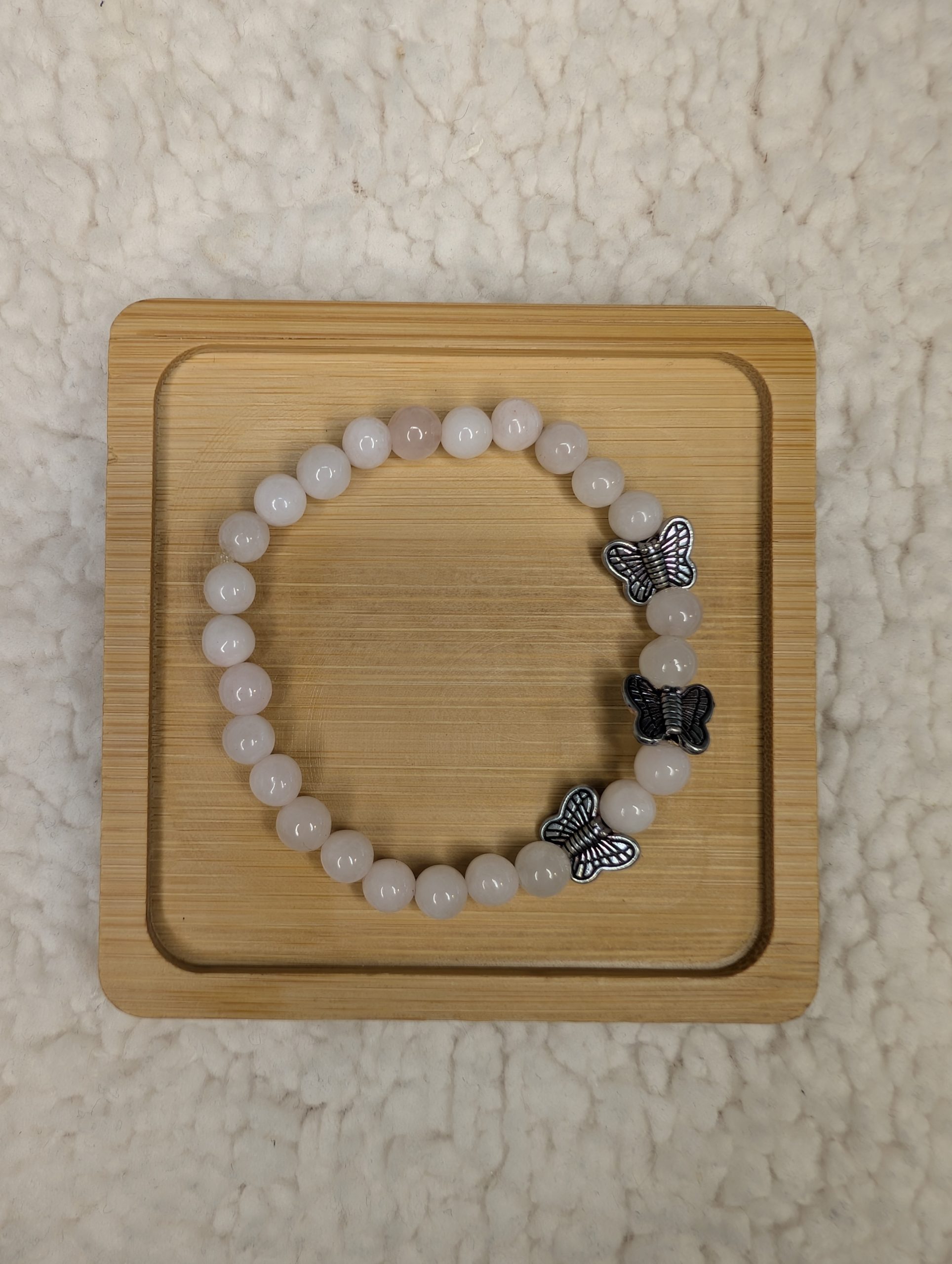 6mm Rose Quartz bracelet with 3 silver butterfly beads