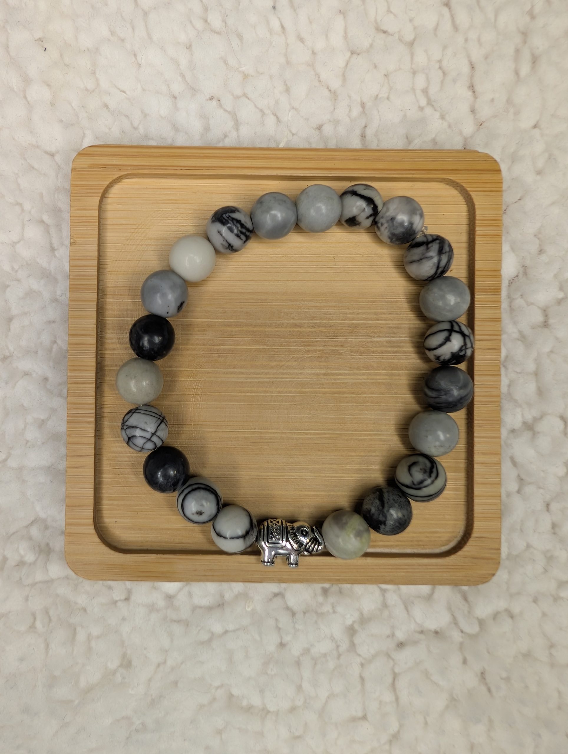 Net Jasper bracelet with silver elephant bead