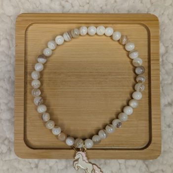 Mother of Pearl bracelet with a pink unicorn charm
